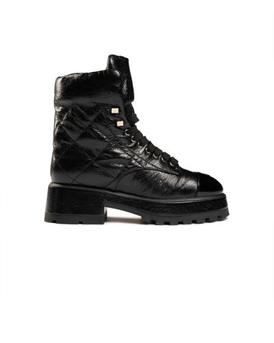 Chanel crumpled patent lambskin combat boots